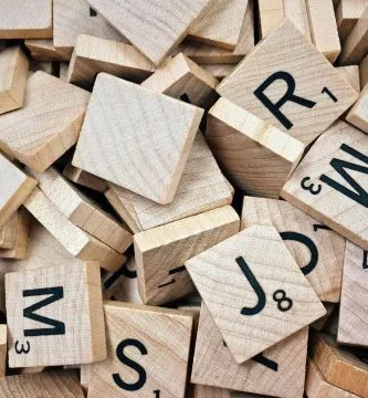 brown scrabble boards with letters