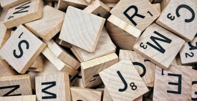 brown scrabble boards with letters